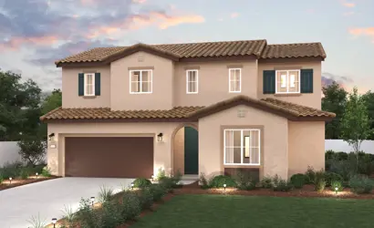 A large house with a driveway.