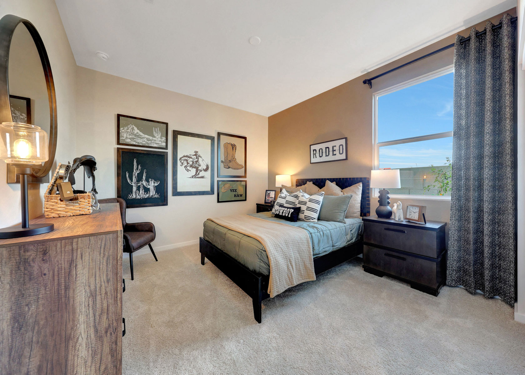 A bedroom with a bed and a desk.