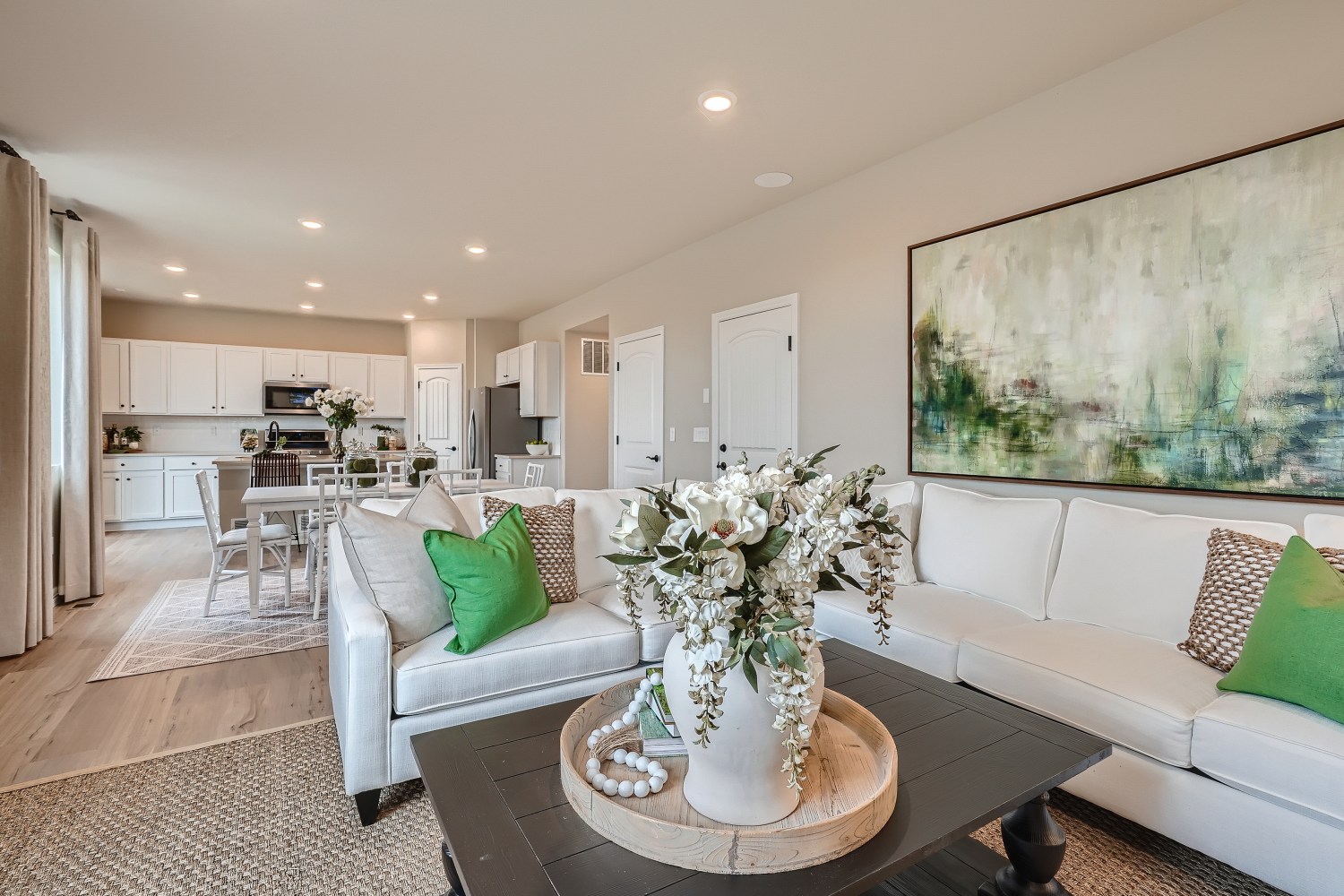 A living room with a couch and a coffee table.
