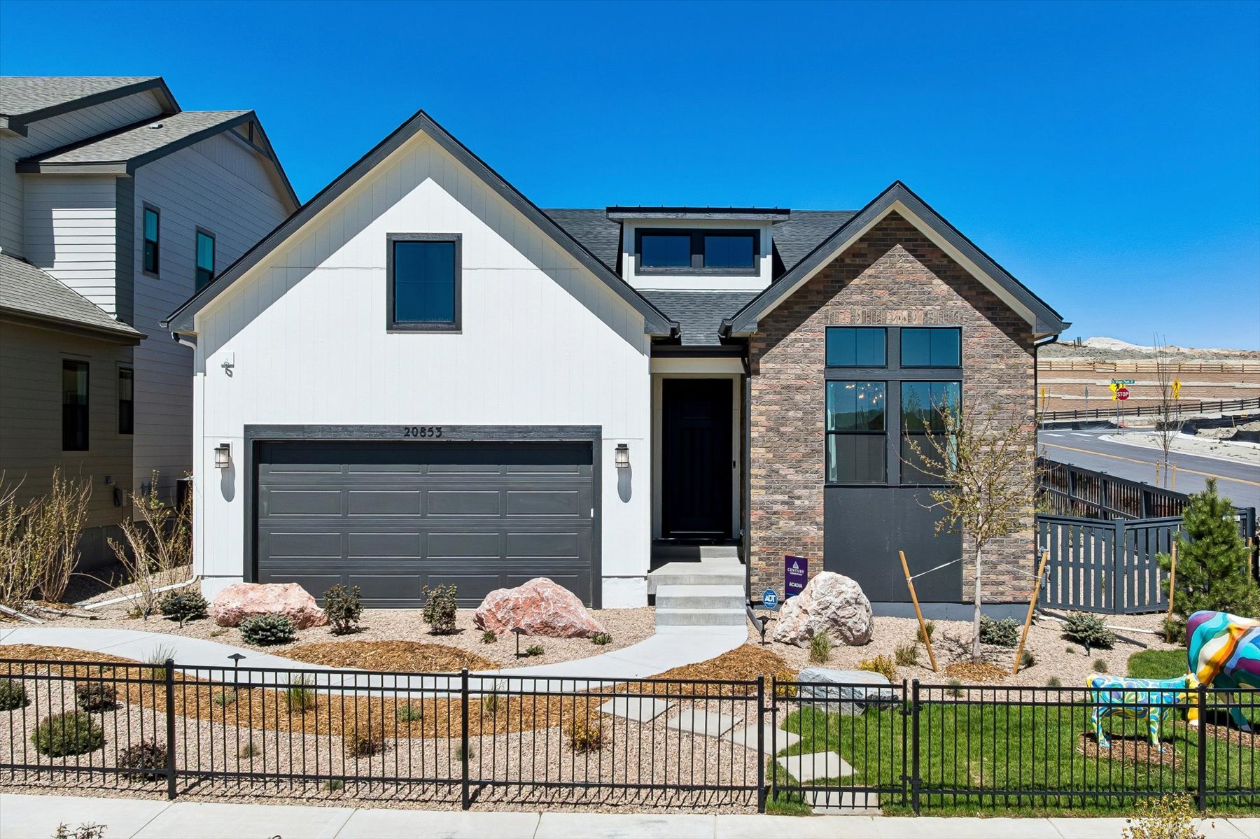 A house with a fence around it.