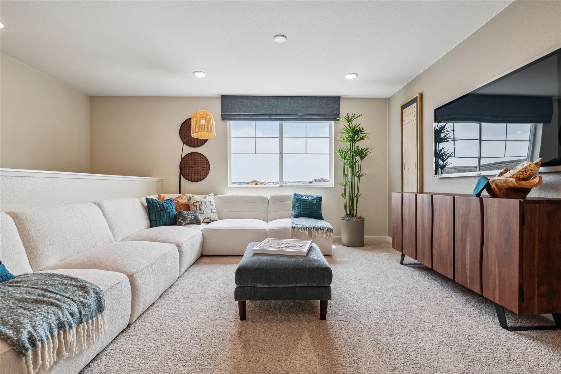 A living room with a couch and a coffee table.