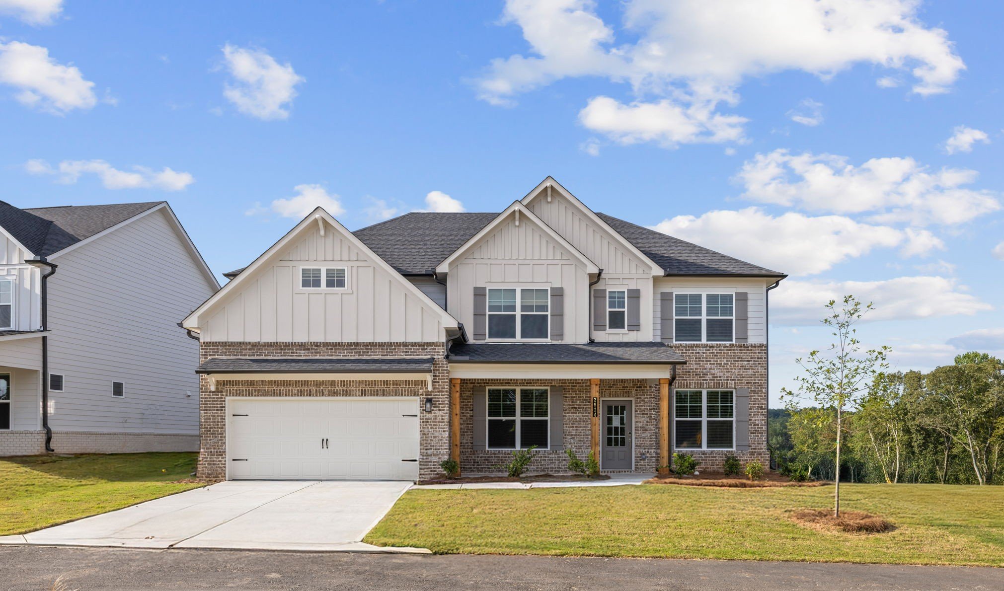 A large house with a driveway.