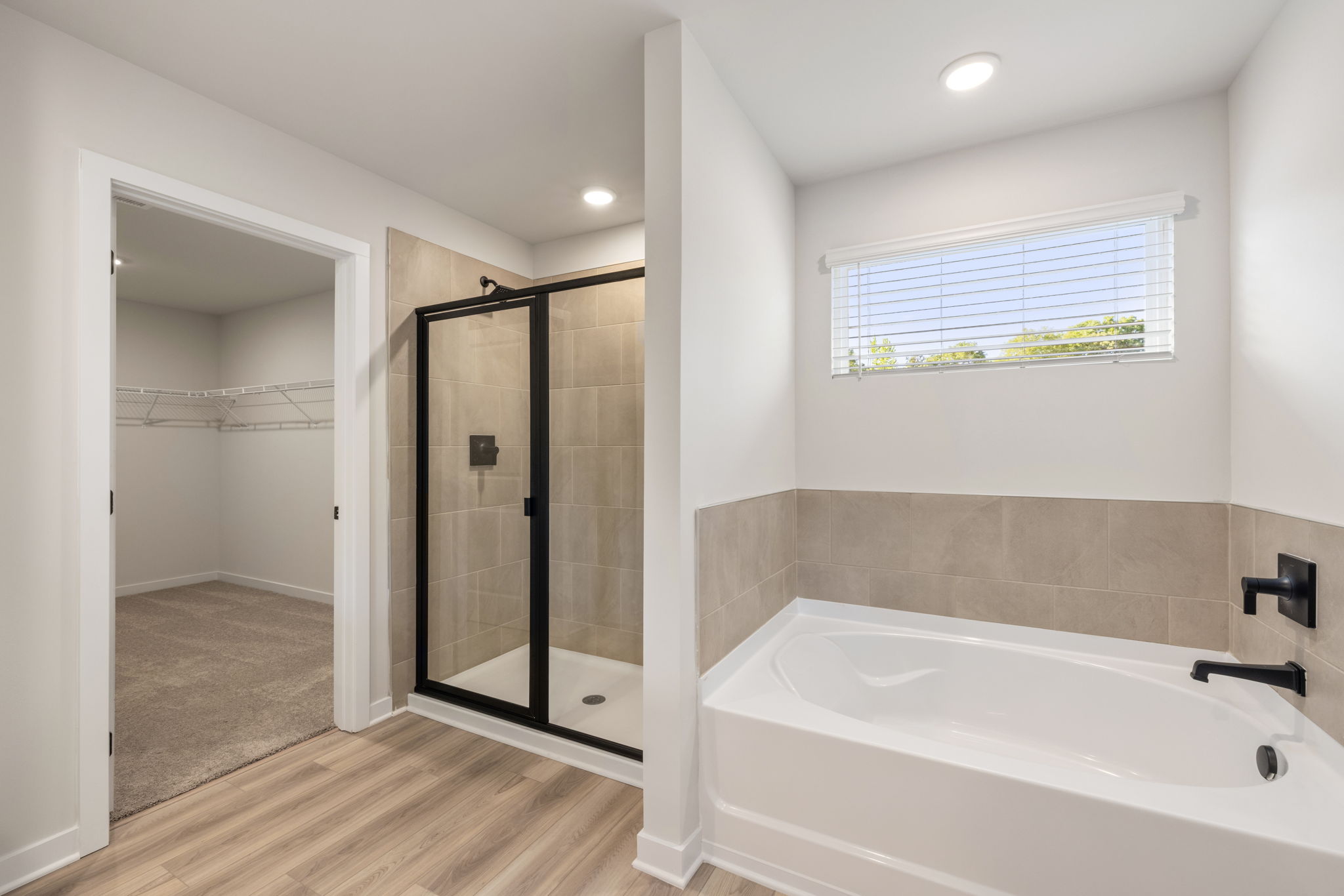 A bathroom with a glass shower.