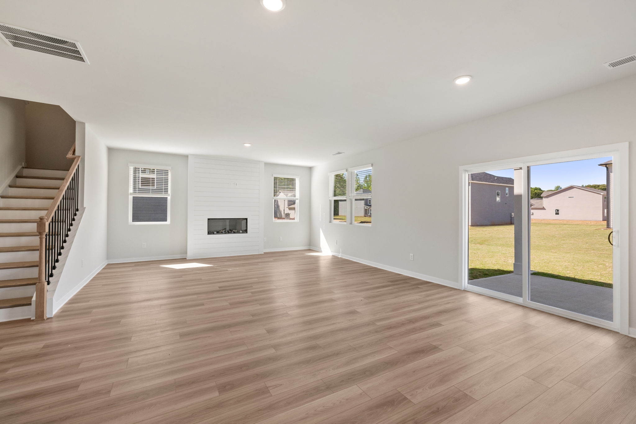 A room with a wood floor and a wood floor with a wood floor.