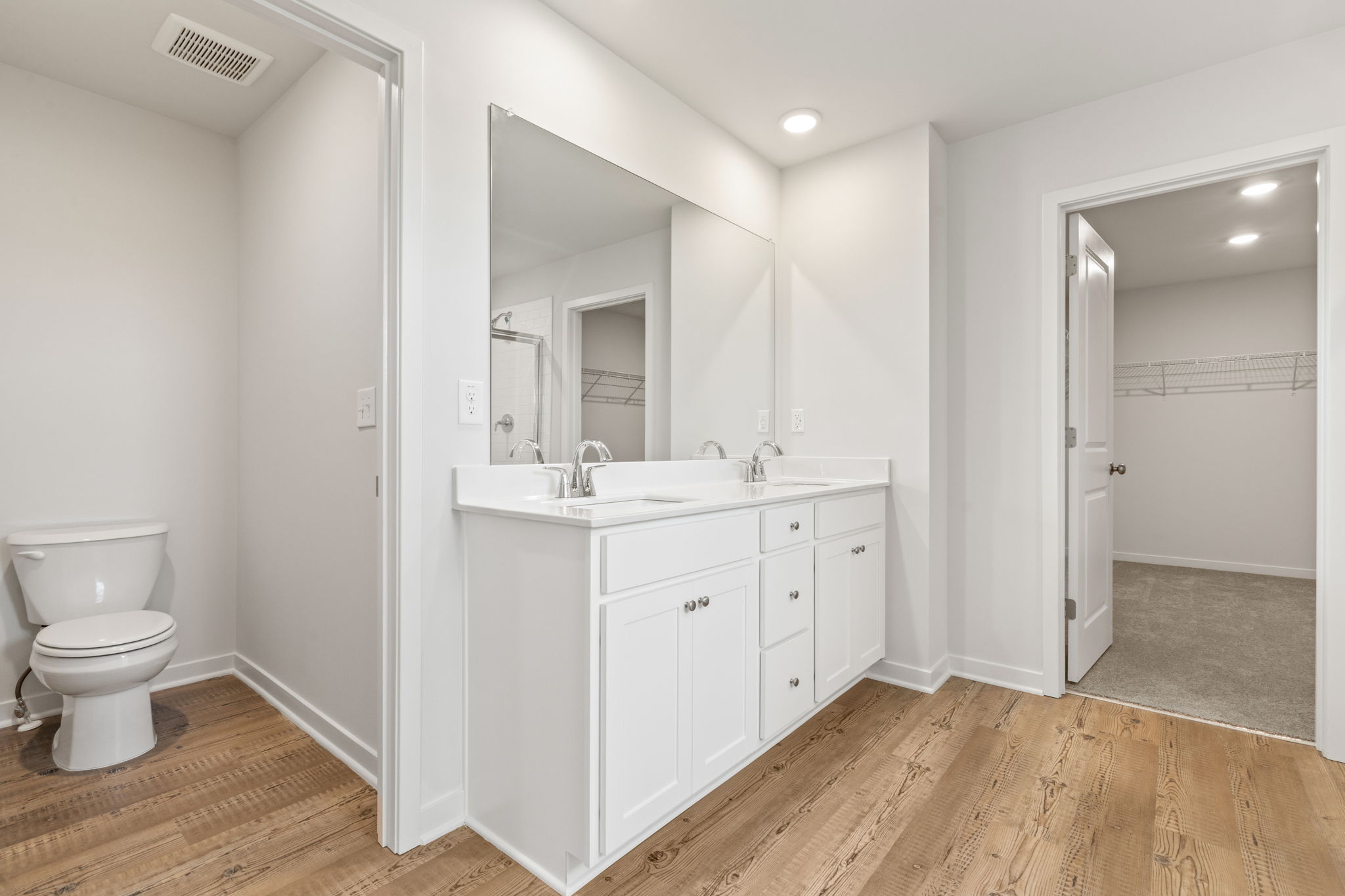 A bathroom with a white sink.