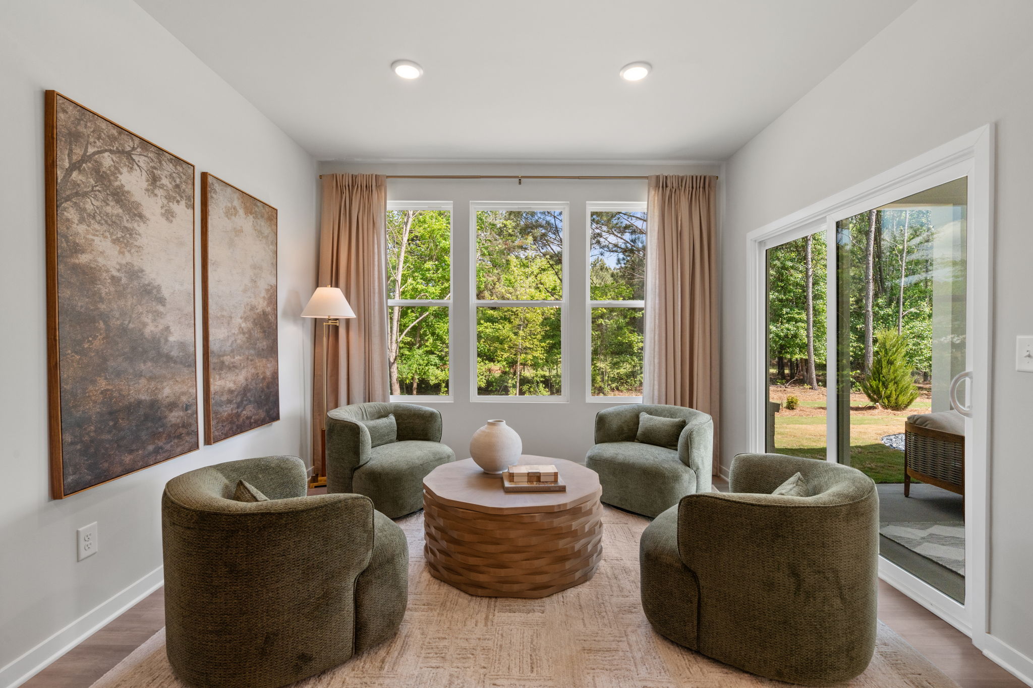A living room with a large window.