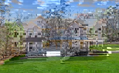 A house with a large front yard.