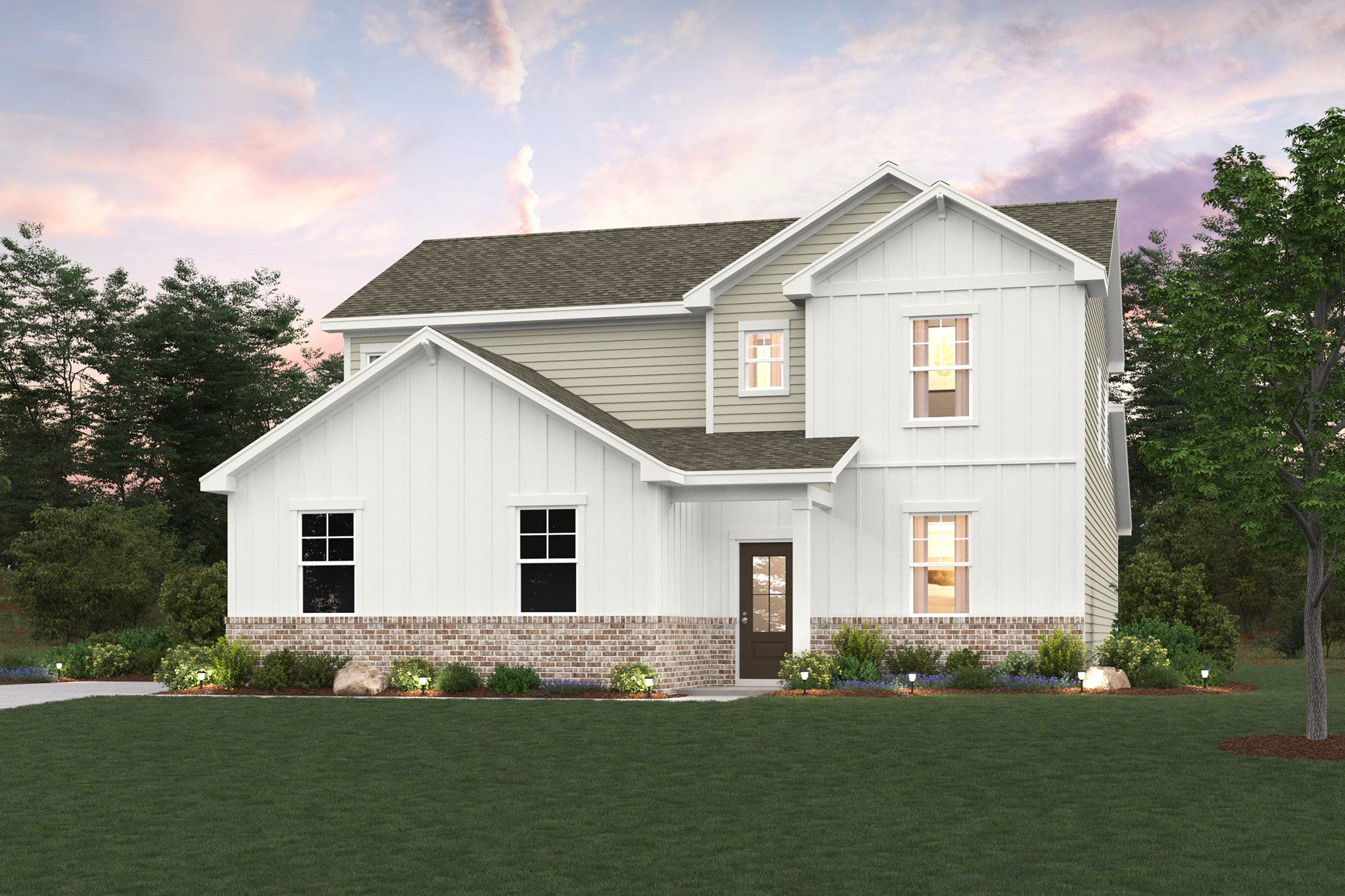 A white house with a lawn.