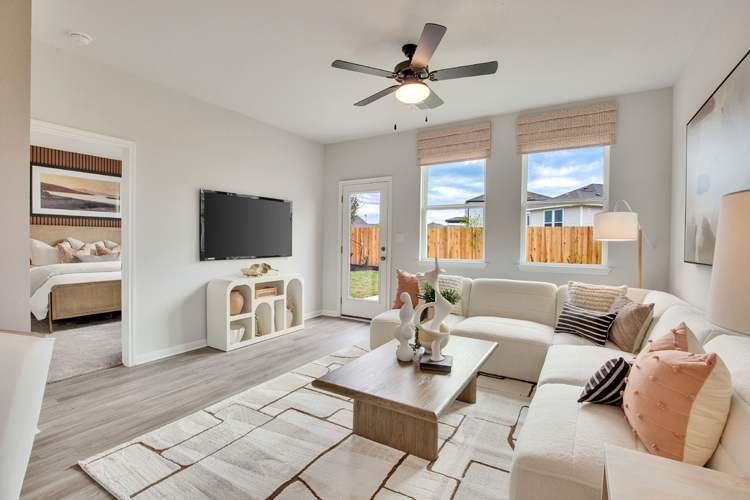 A living room with a large window.