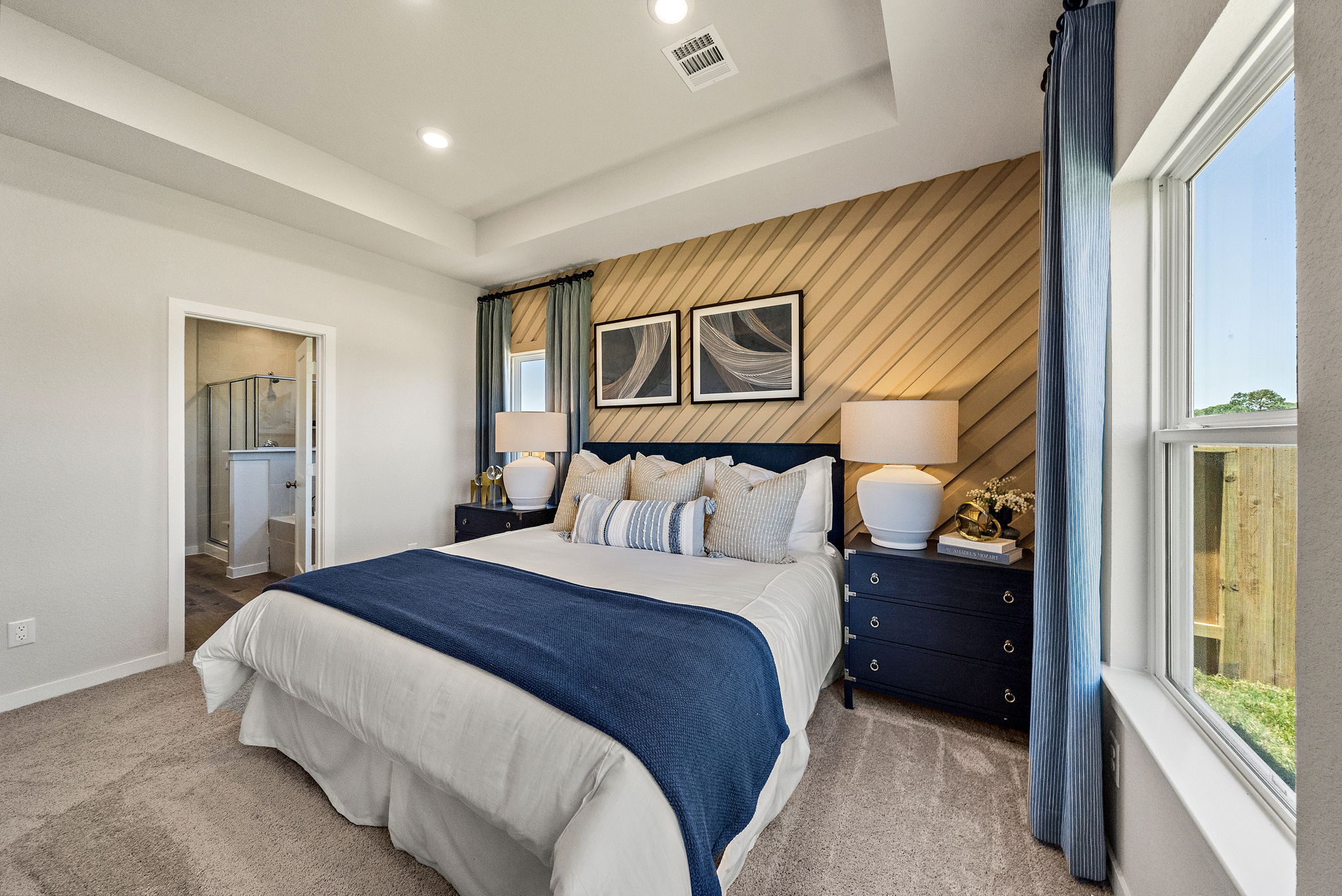 A bedroom with two beds.