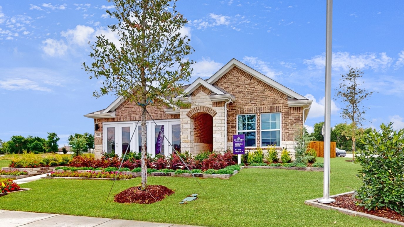 A house with a large lawn.