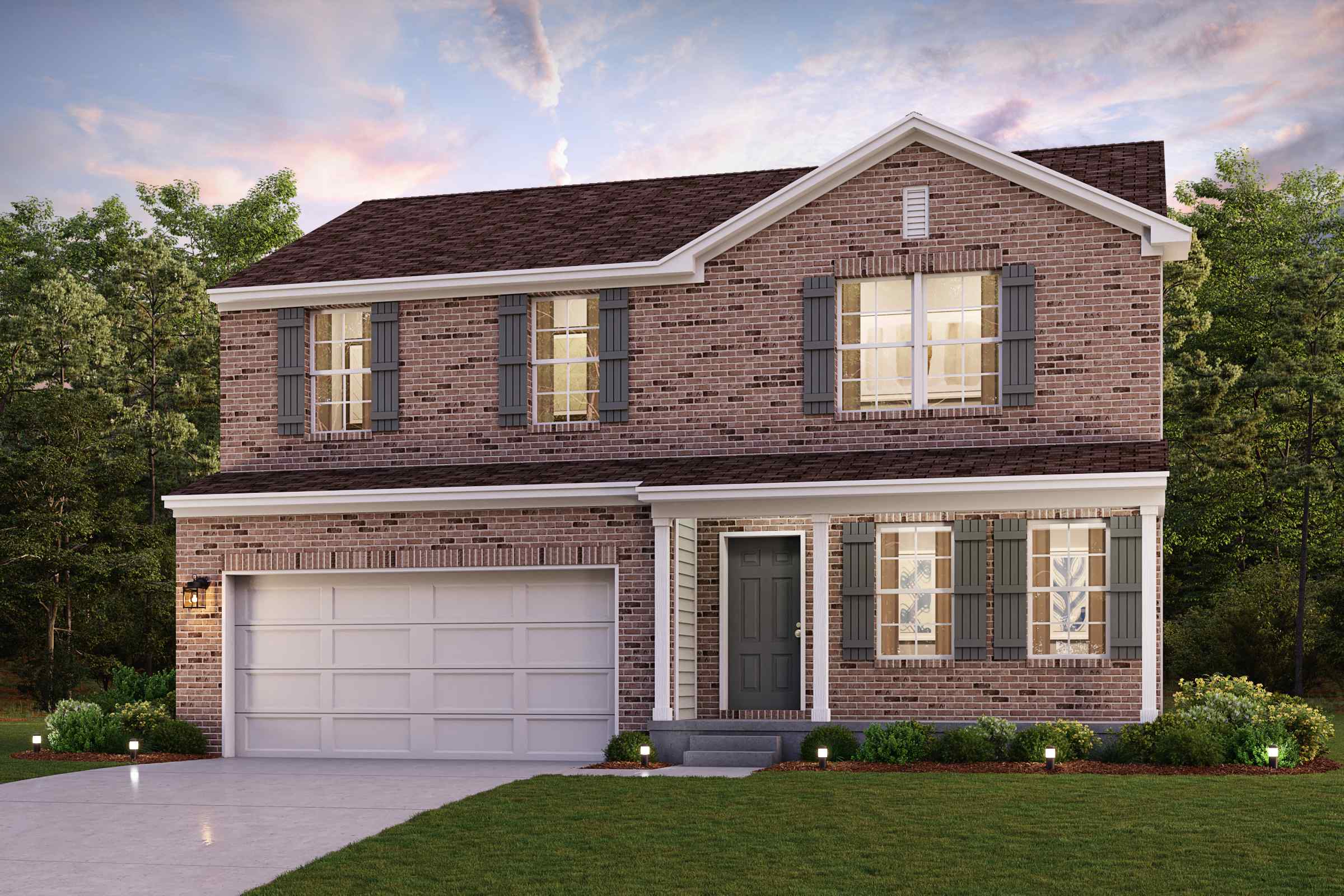 A large brick house with a garage.