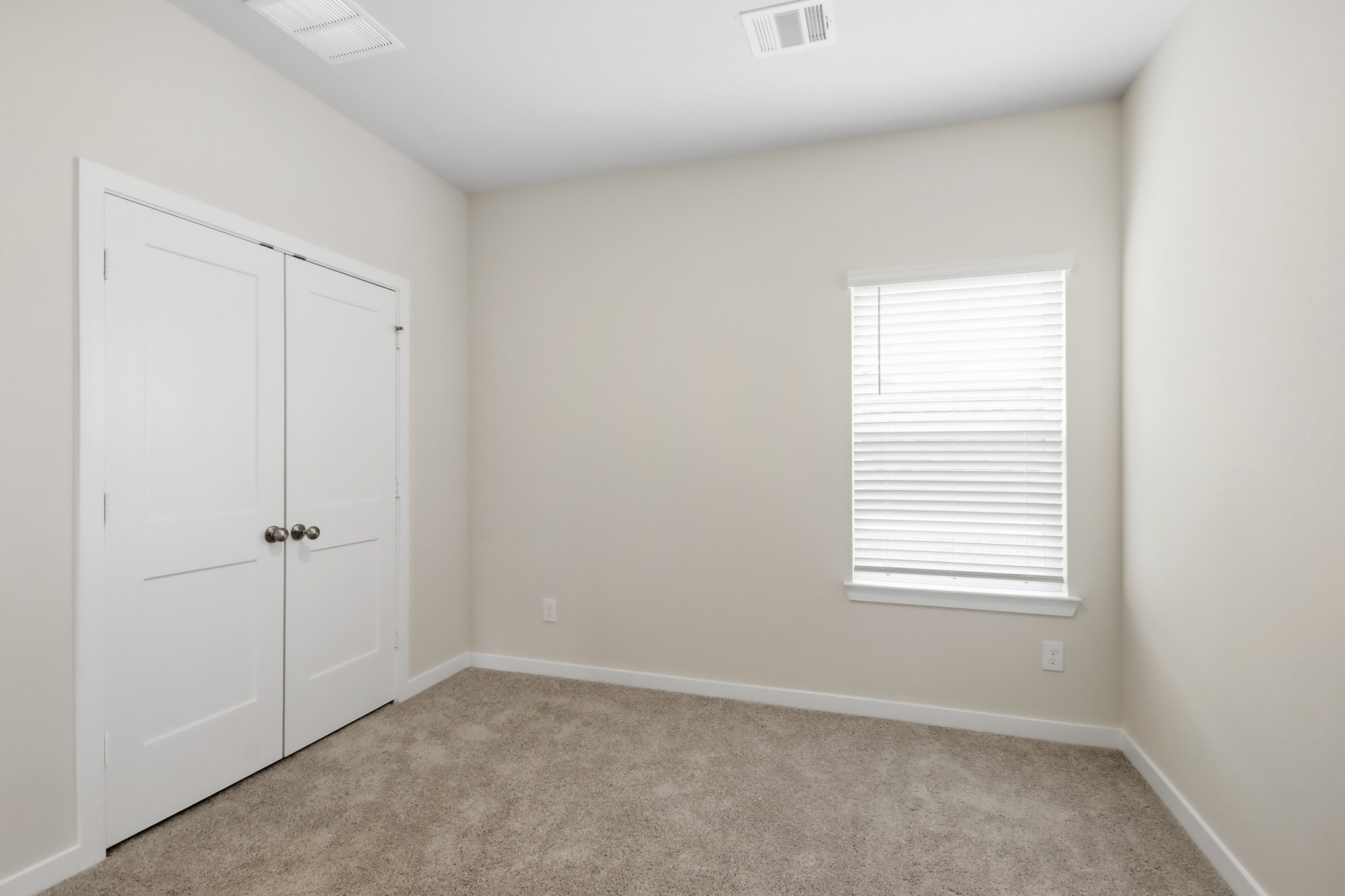 A room with white doors.