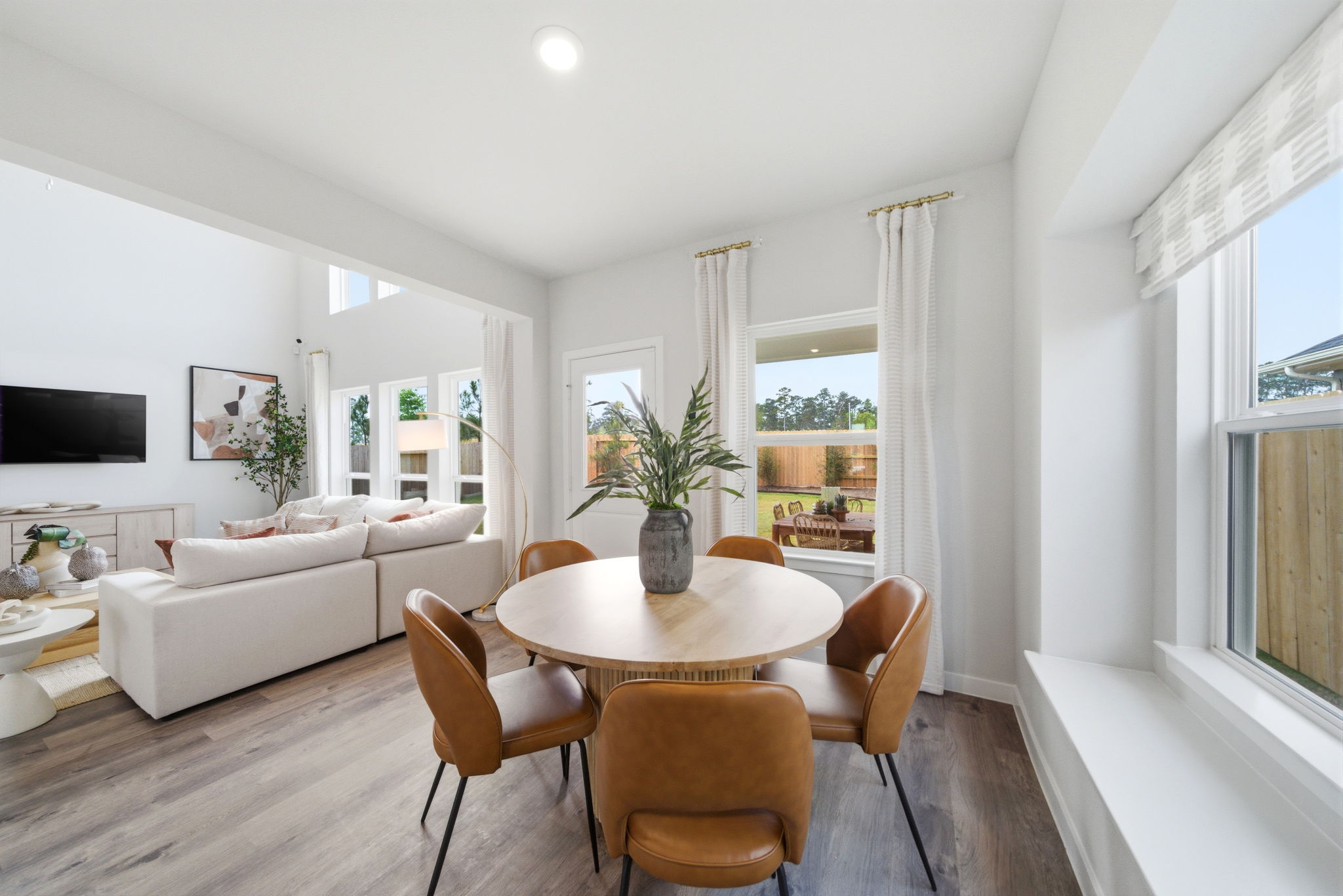 A living room with a large window.