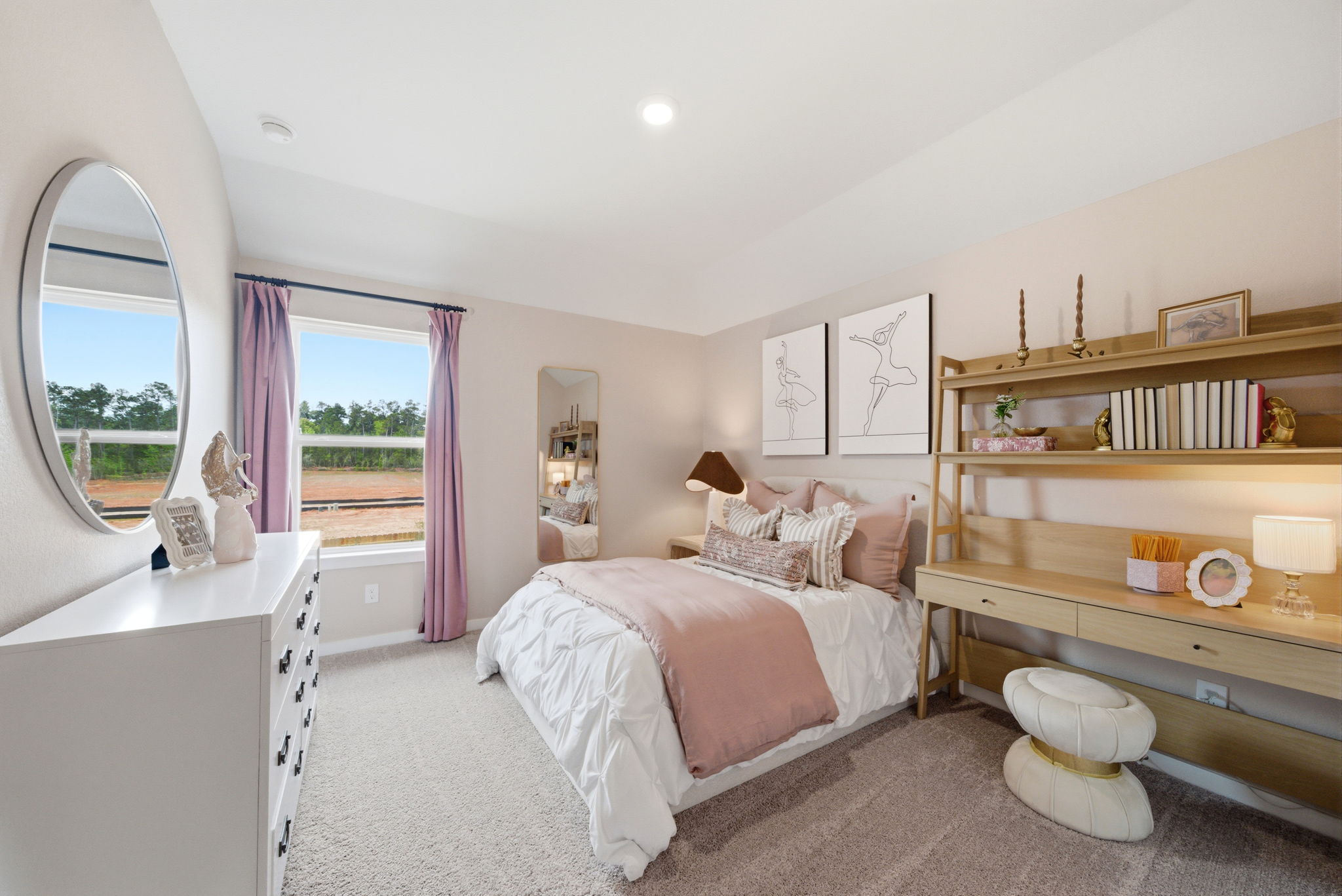A bedroom with a large mirror.