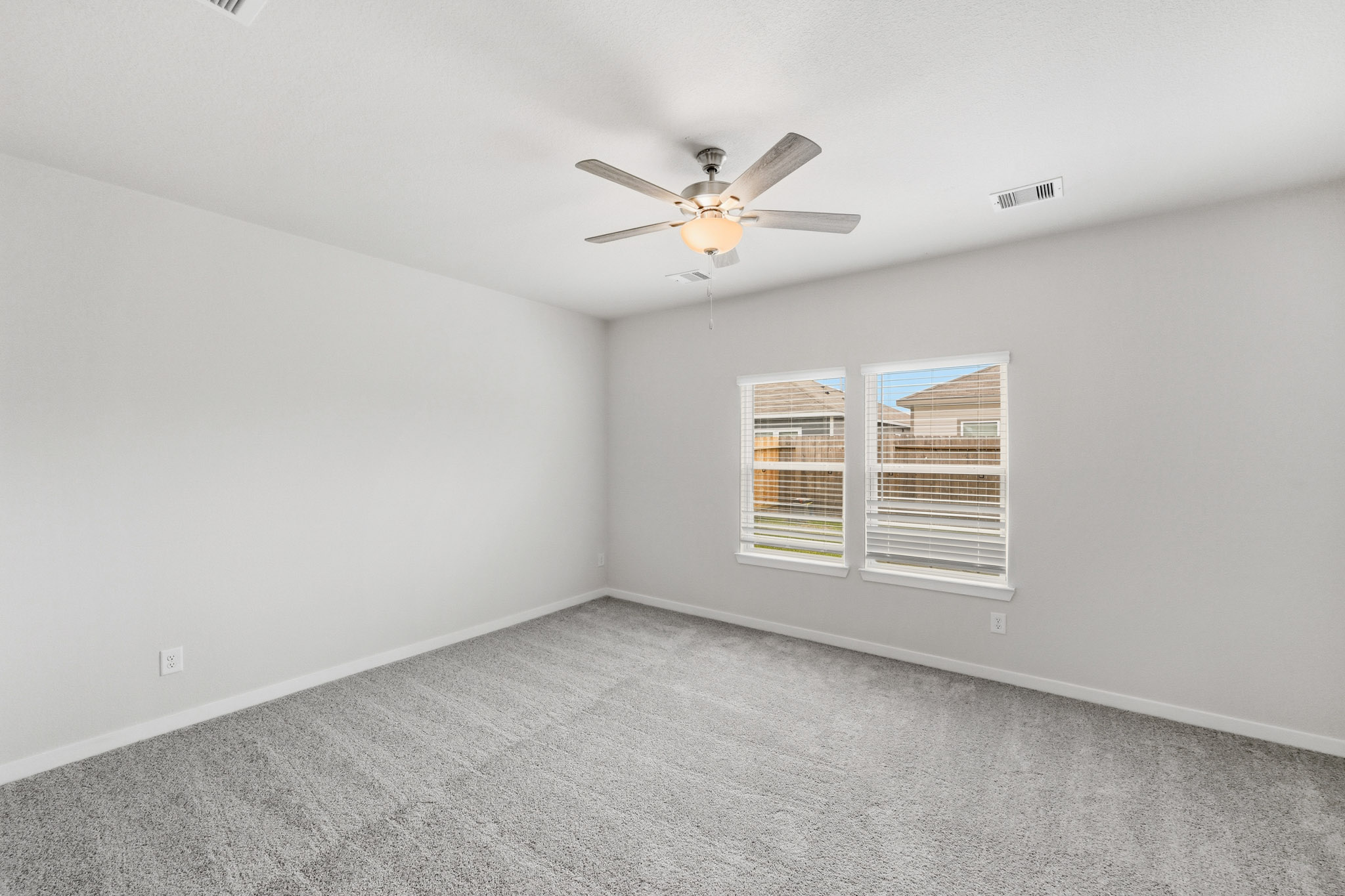 A ceiling fan in a room.