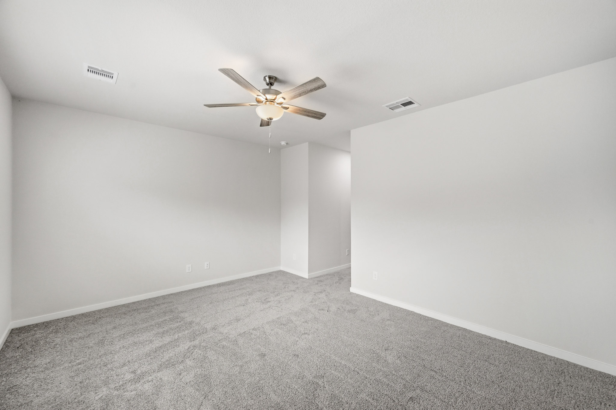 A ceiling fan in a room.