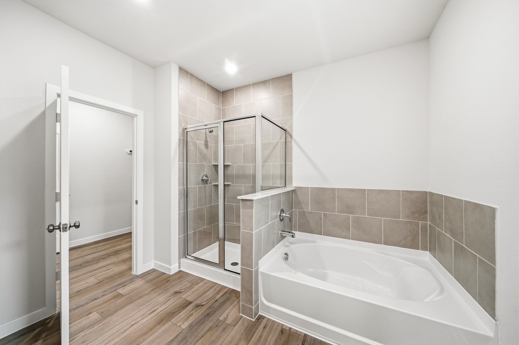A bathroom with a glass shower.