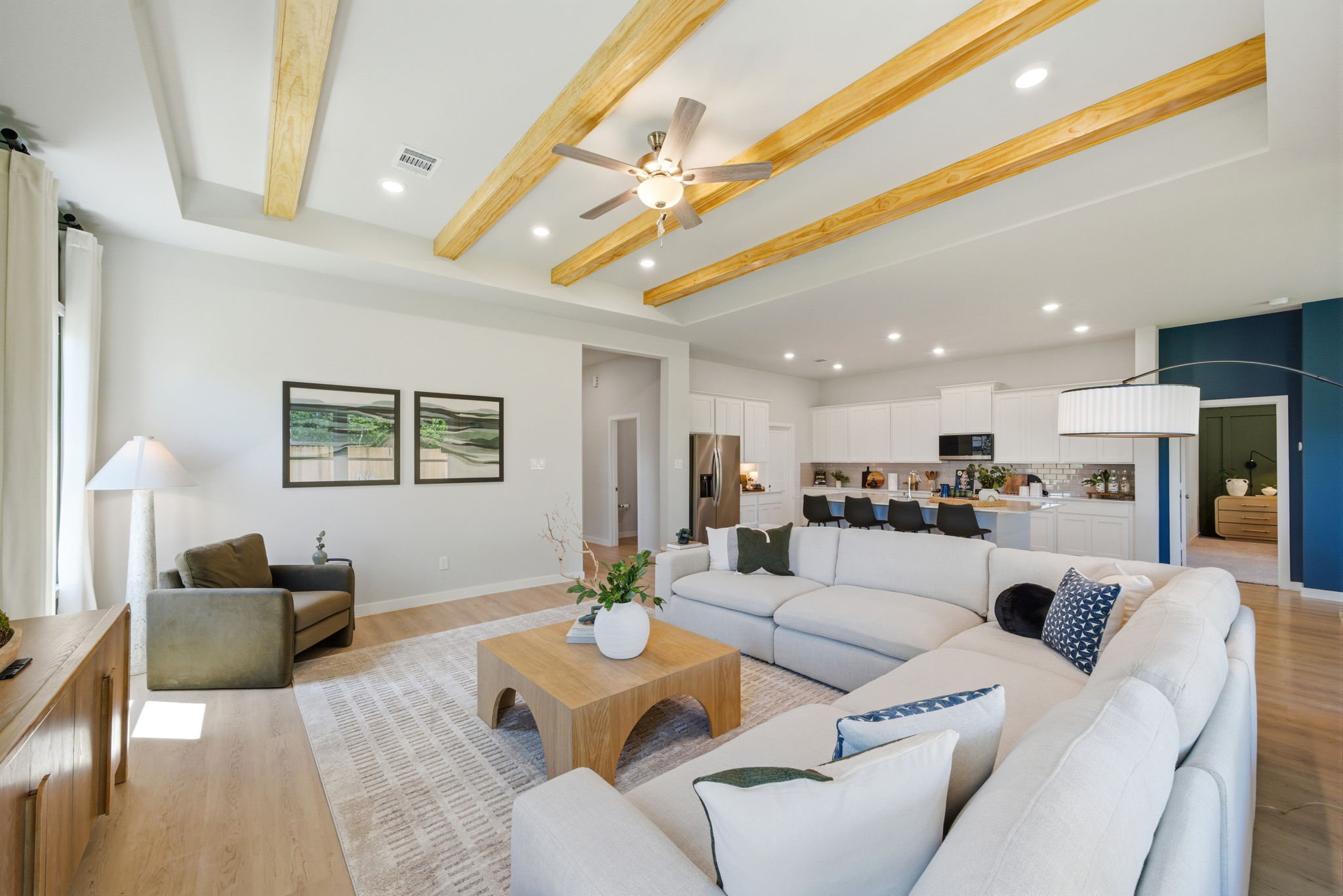 A living room with a large ceiling.