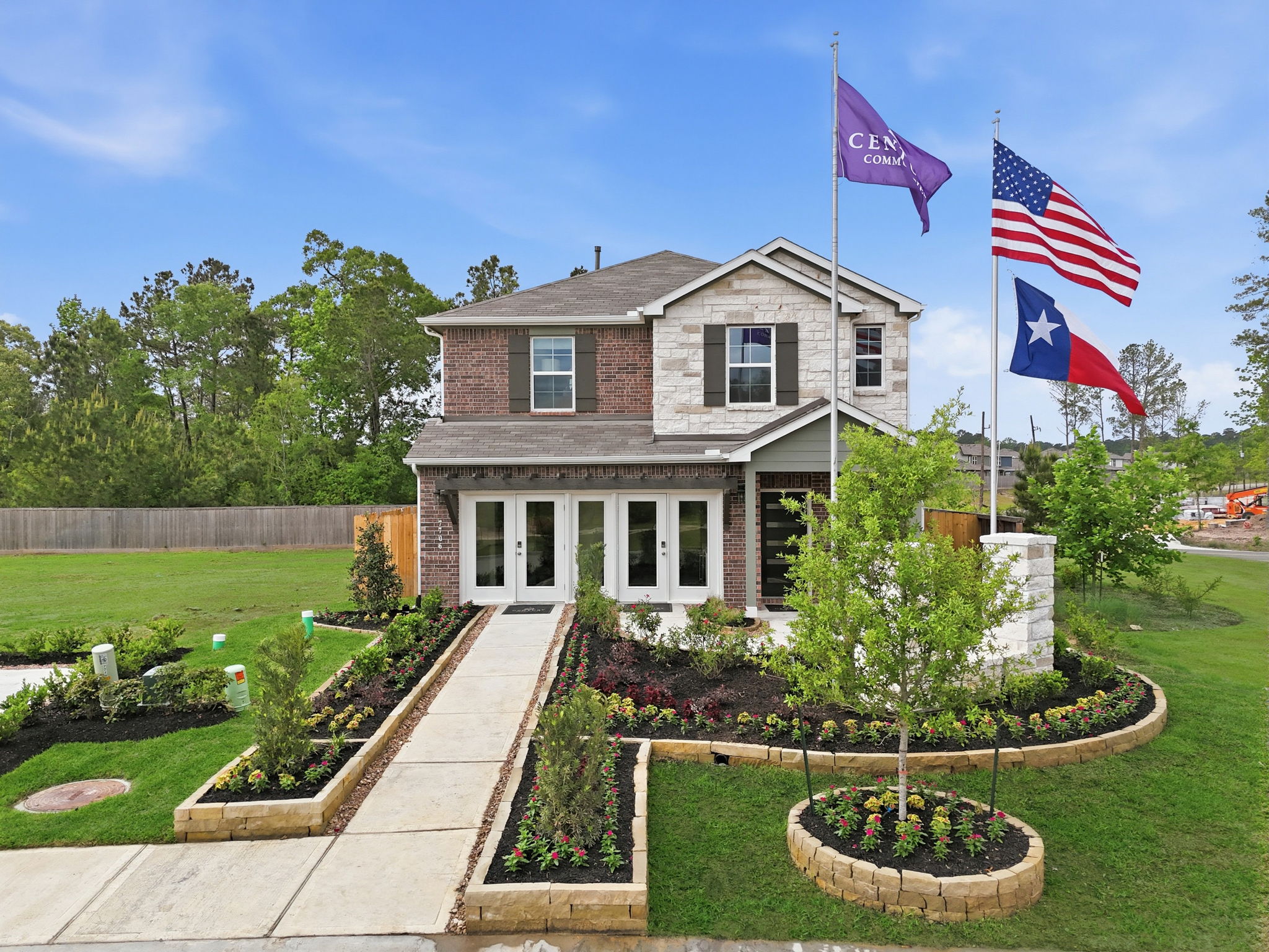 A house with flags in the front.