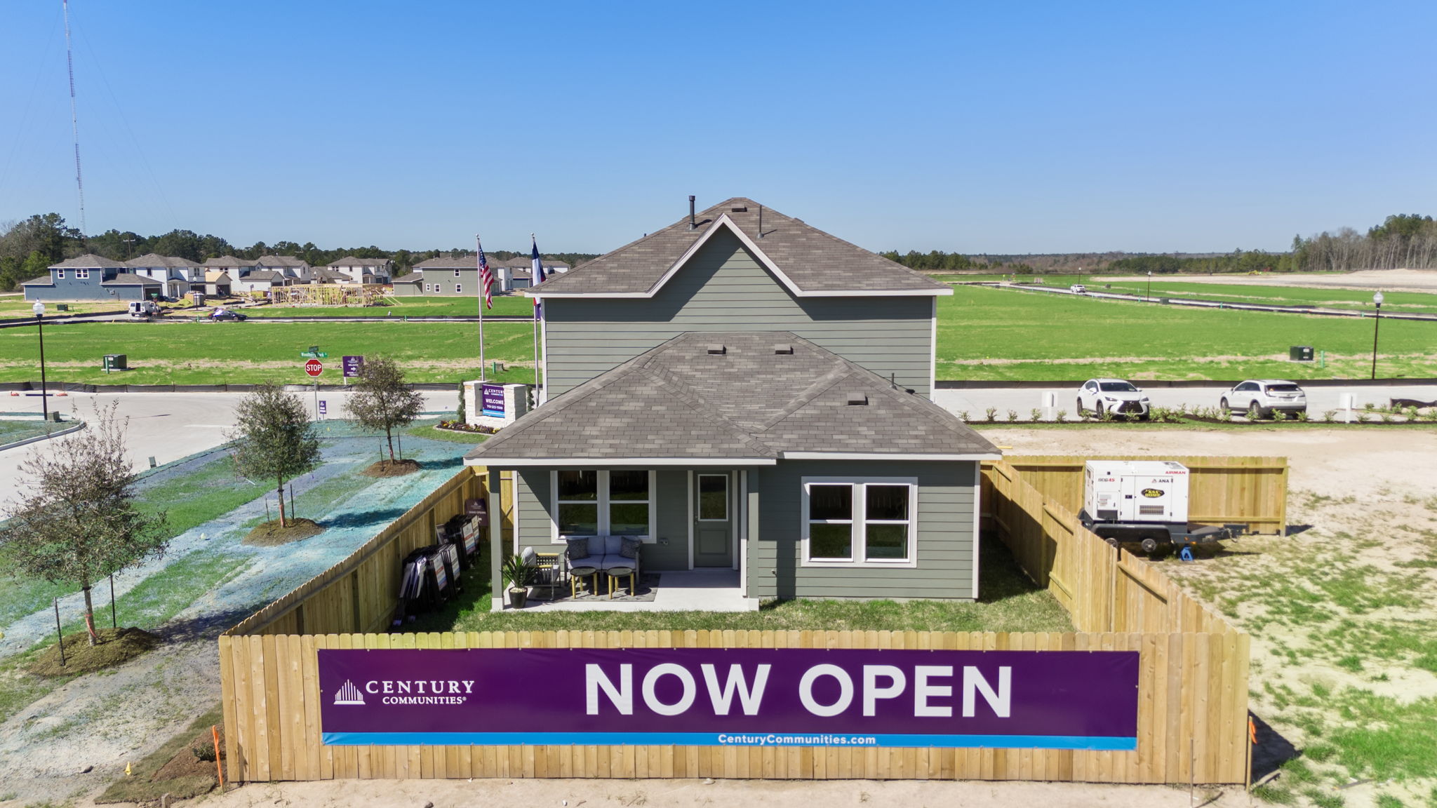 A house with a sign in front of it.