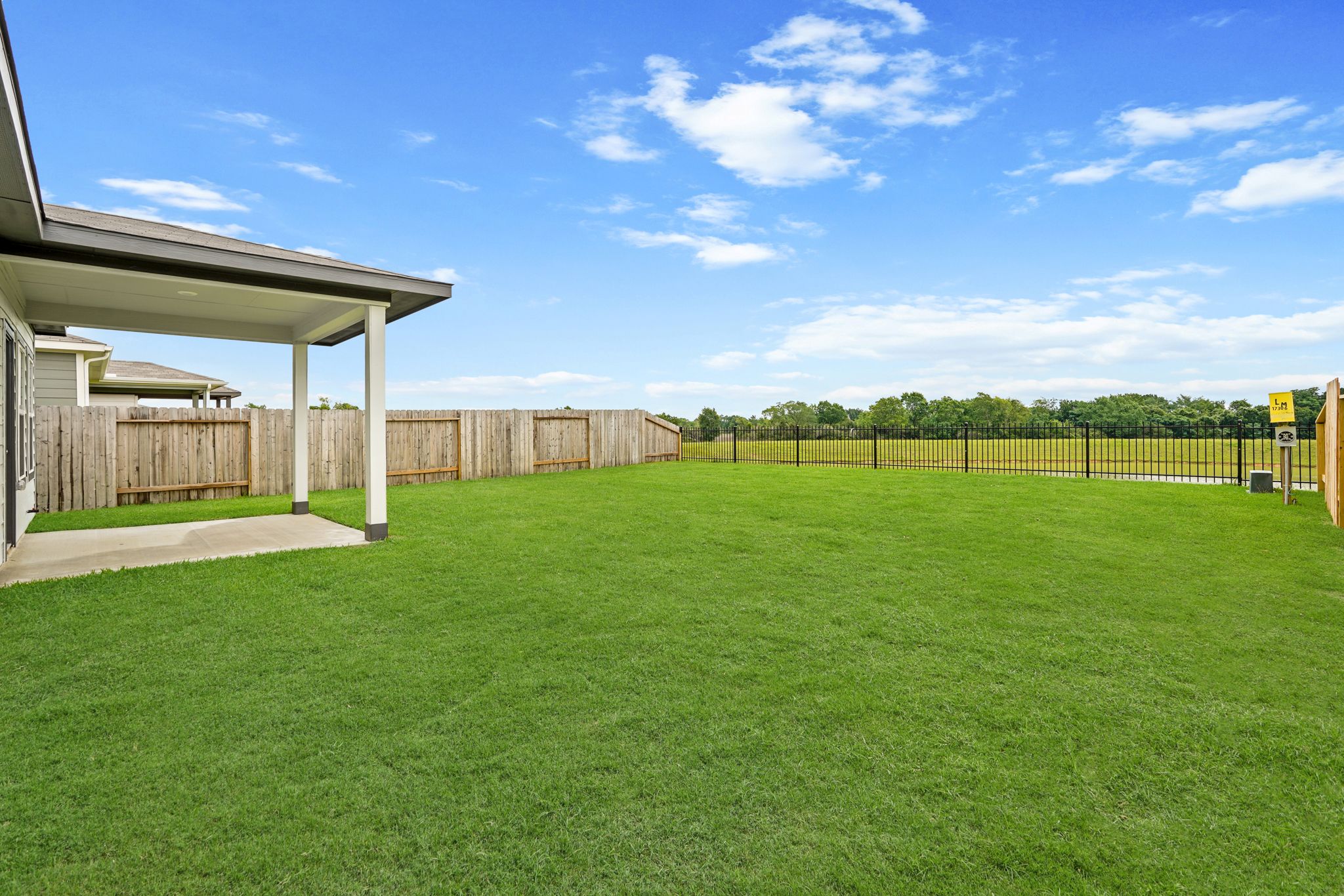 A large green lawn.