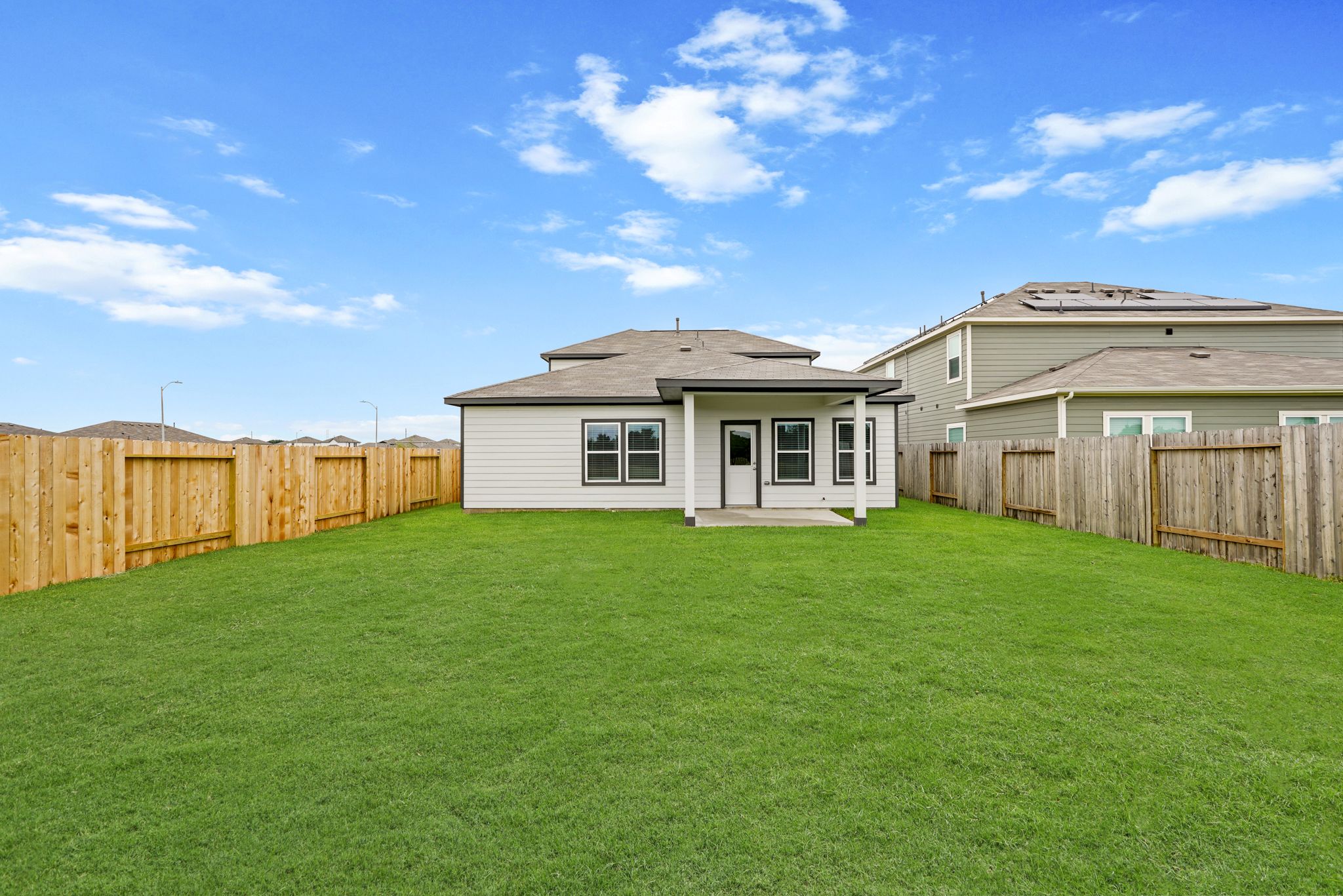 A house with a fence around it.