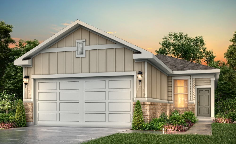 A house with garages and a driveway.