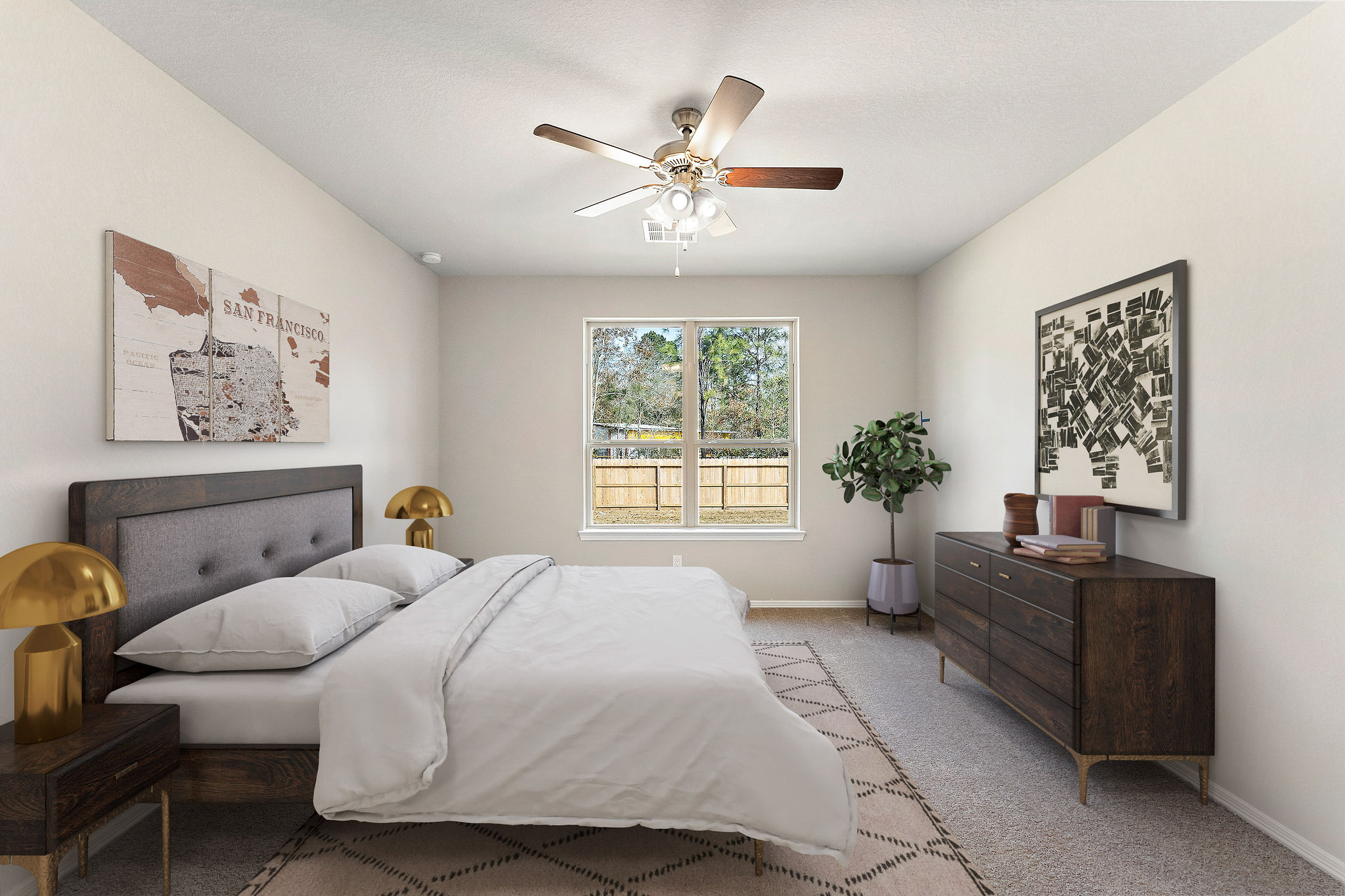 A bedroom with a bed and a fan.