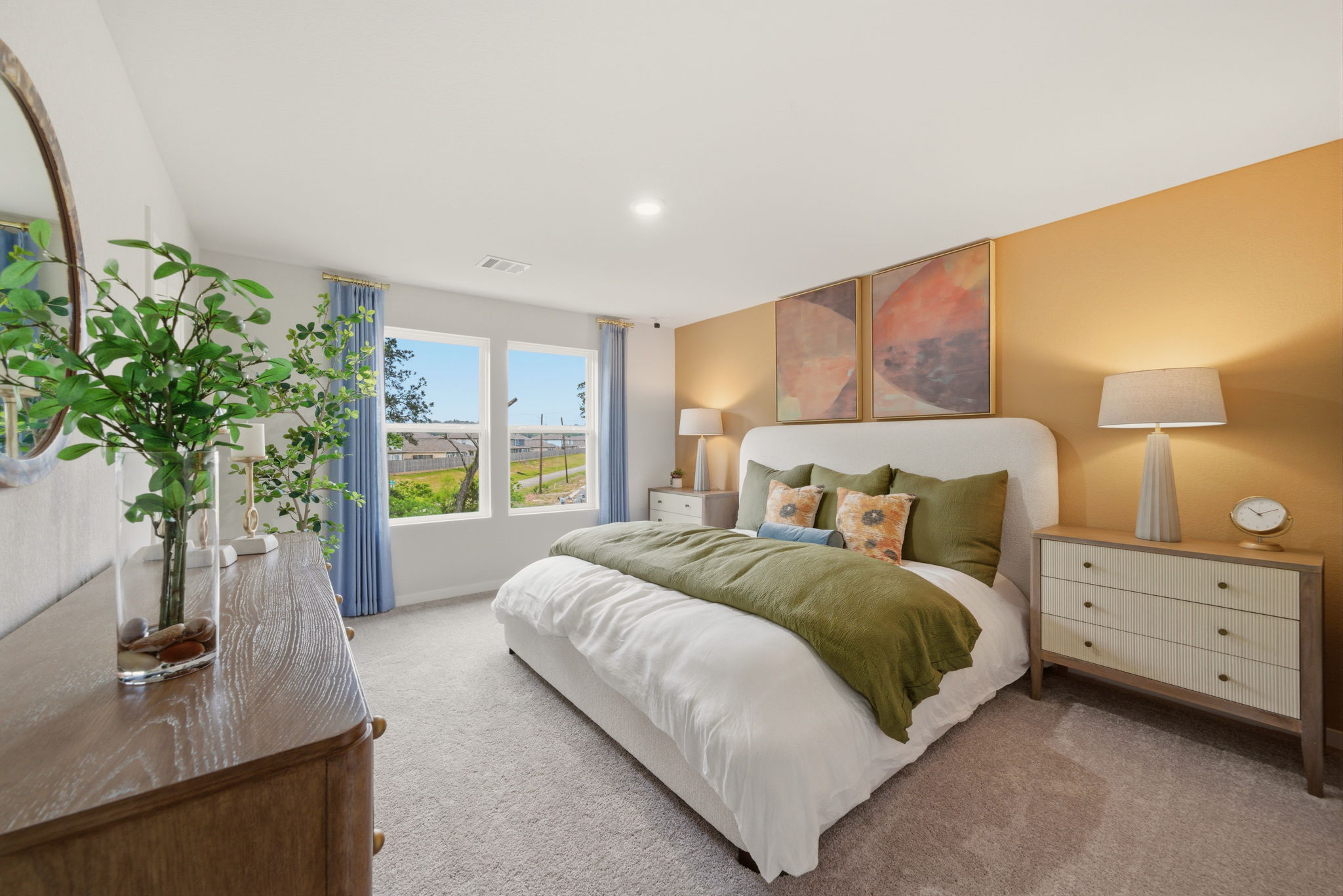 A bedroom with a large bed.