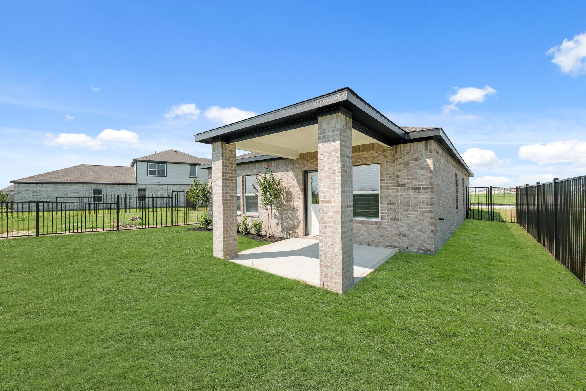 A house with a fence around it.
