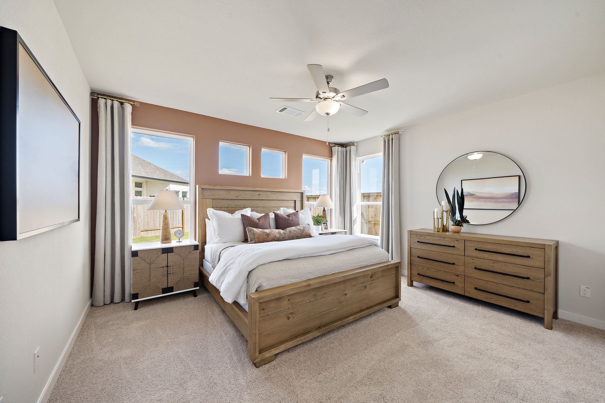 A bedroom with a large bed.