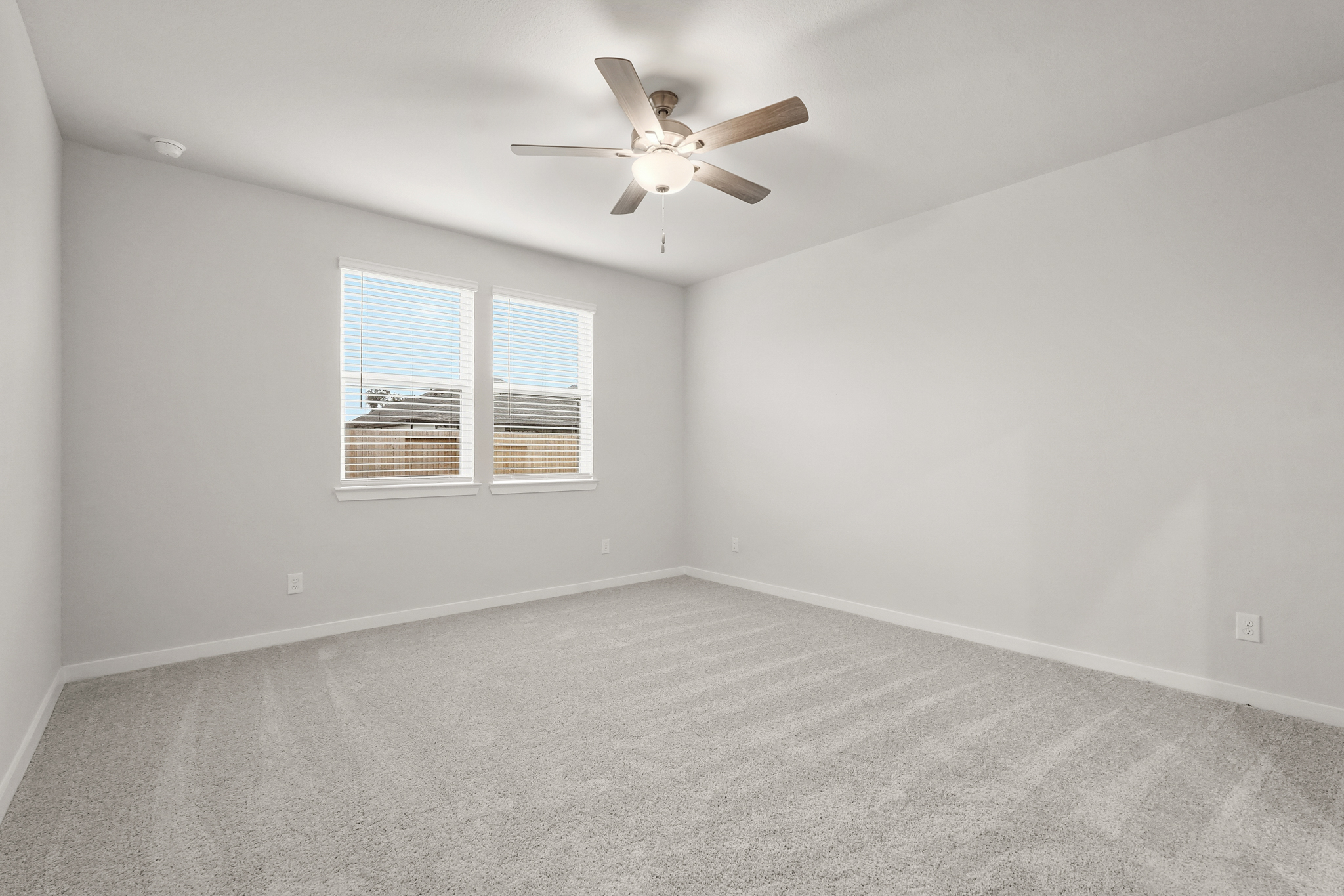 A ceiling fan in a room.