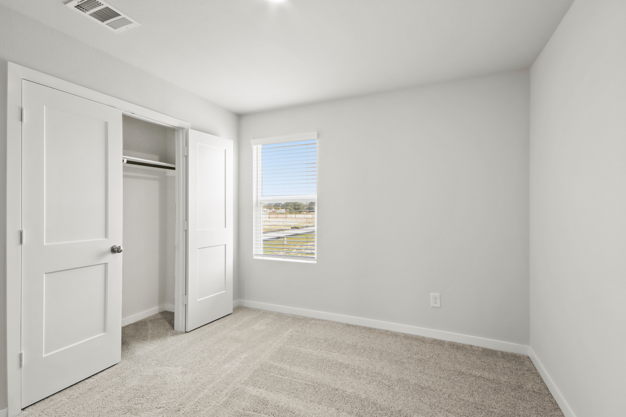 A room with white doors.