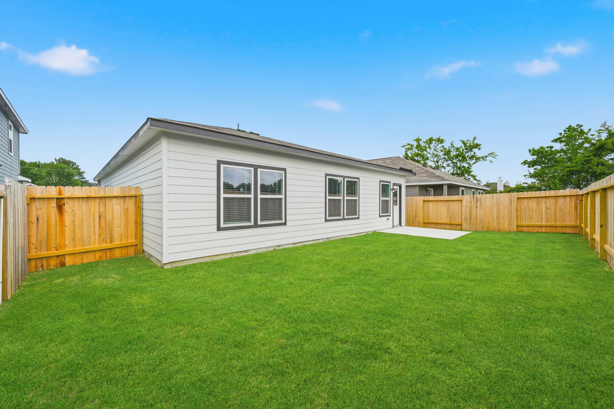 A house with a fence around it.