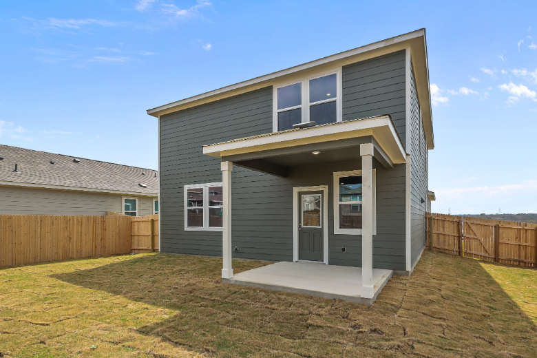 A house with a fence around it.