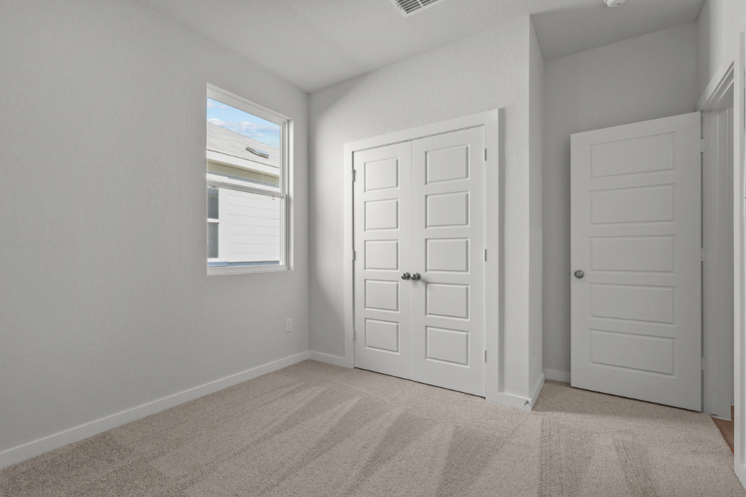A room with white doors.