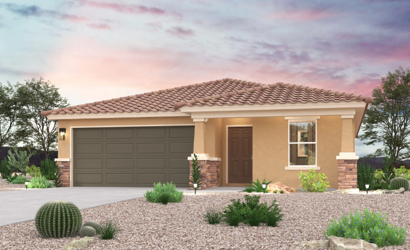 A house with a garage and bushes.